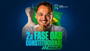 Foto promocional do professor Ítalo Rebouças sorrindo, à frente da estátua da Justiça (Themis) e da bandeira do Brasil desfocada ao fundo. Abaixo, o texto em destaque azul e verde diz '2ª Fase OAB Constitucional Regular'. No canto superior direito, a logomarca 'IR Curso Preparatório'.